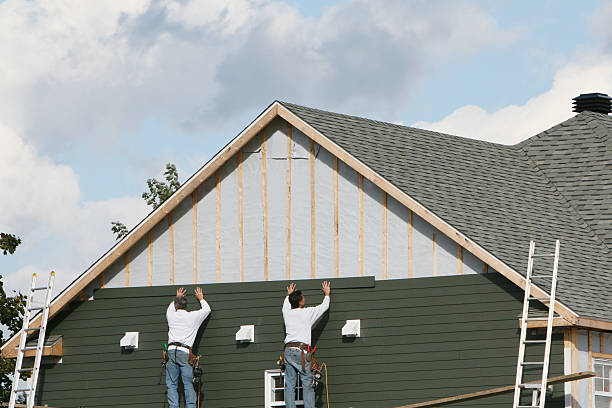 Professional Storm Damage Siding Repair technician working in Bennett, NC